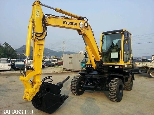 Колёсный экскаватор Hyundai R555W-7